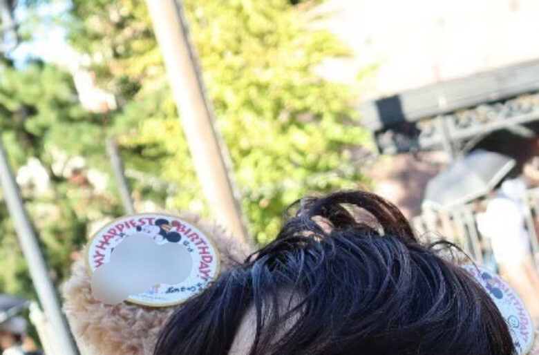 A birthday sticker is pasted on a headband